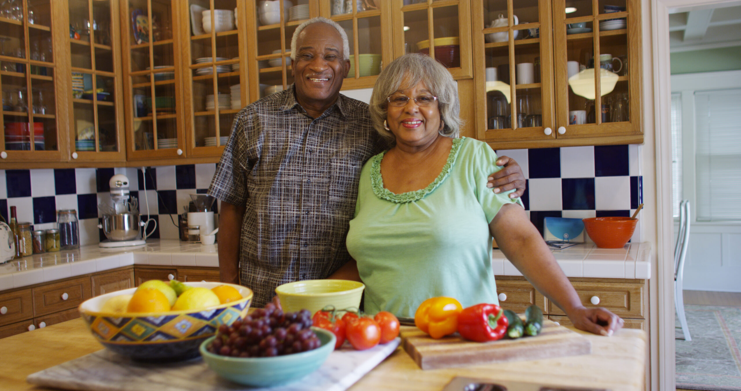 Happy mature black couple in the kitchen